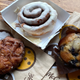 From left: McDonald's new apple fritter, cinnamon roll, and blueberry muffin